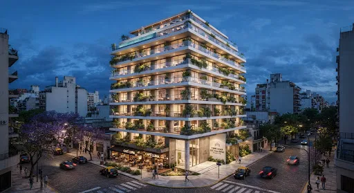 Professional architectural photograph of a modern 16-story luxury residential building in corner lot at dusk, exterior illuminated facade with horizontal concrete slabs, glass balustrades, lush plant terraces, warm interior lighting, ground floor commercial café, high-end design in Buenos Aires.